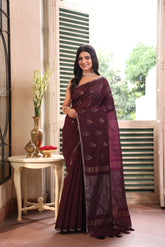 KAVVYA SOFT & LIGHT WEIGHT WINE HANDLOOM WEAVED TUSSAR SAREE WITH BEAUTIFUL MOTIF ALLOVER THE SAREE IN SILVER AND GOLDEN ZARI COMES WITH SAME COLOUR BLOUSE